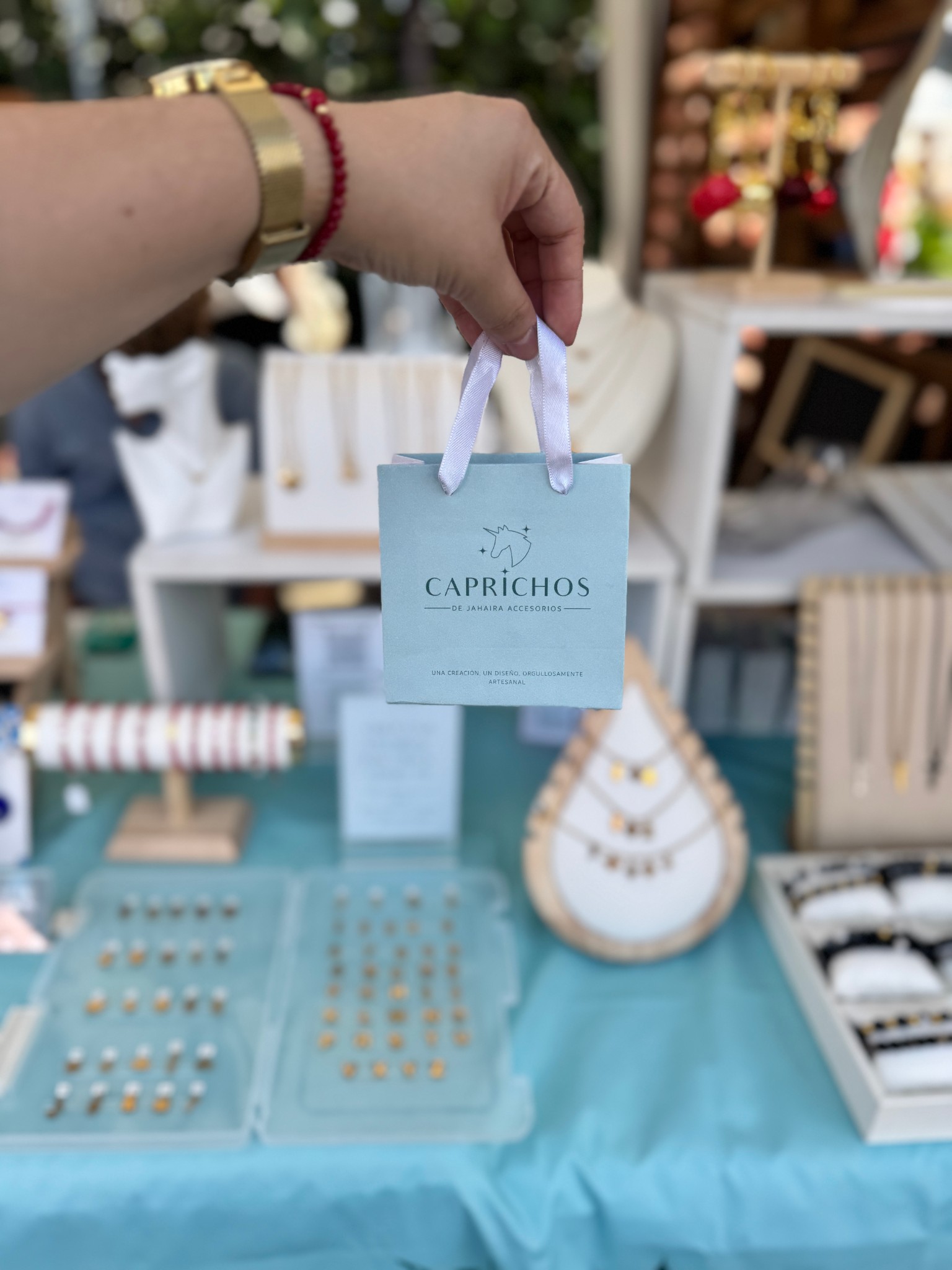 Stand de accesorios Caprichos en feria